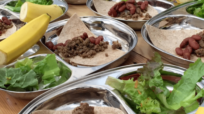 plate of banana, ground meat, and lettuce